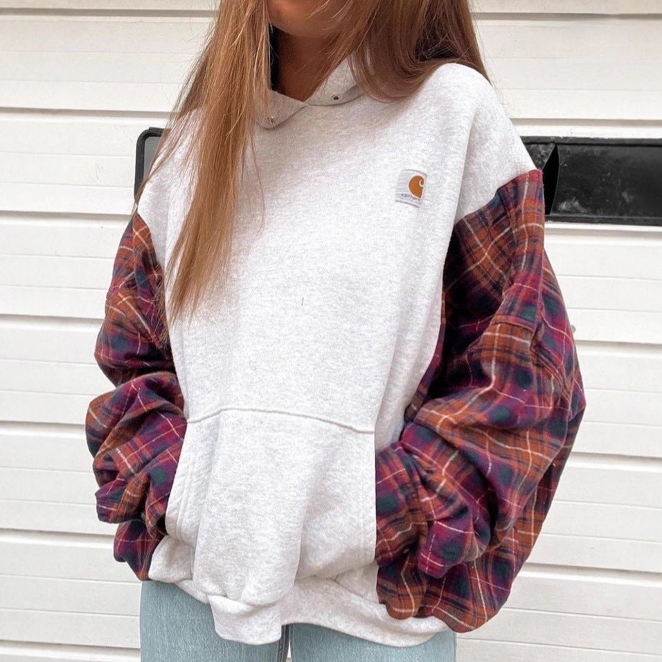Women's oversized hoodie with checkered flannel sleeves and kangaroo pocket Mune Fashion