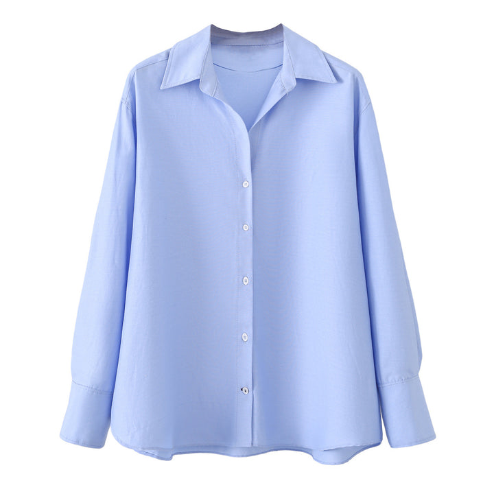 Women's oversized shirt blouse with a wide cut, long cuffed sleeves, and rounded hem Mune Fashion