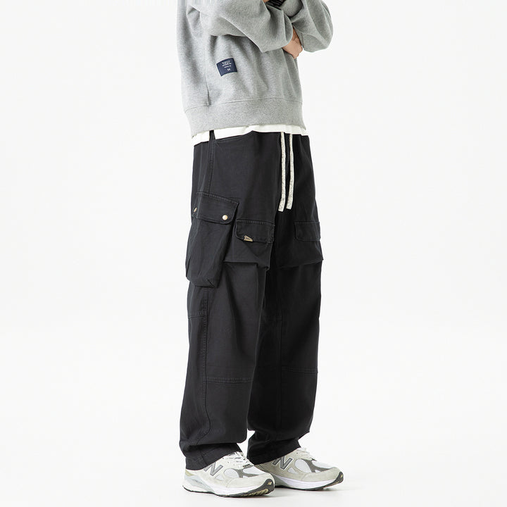 Men's loose cargo pants with elastic waistband, drawstring, and generous flap utility pockets Drune