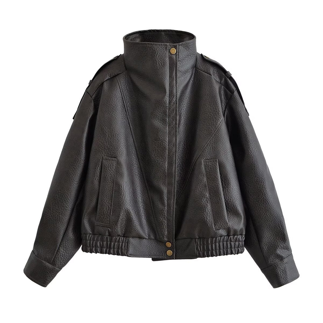 Women’s short jacket in aviator style made of synthetic leather with high standing collar, shoulder straps, and fitted ribbed hem Mune Fashion
