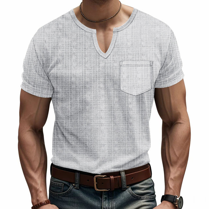 Men's short-sleeve shirt with V-slit neckline and patch chest pocket made of textured jersey Mune Fashion