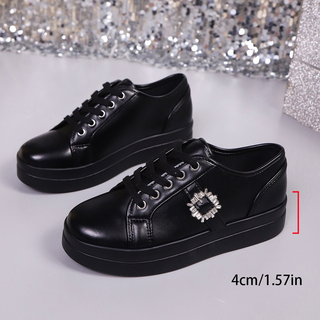 Ladies' platform sneaker with metallic upper material, decorative rhinestone buckle, and padded comfort sole Mune Fashion