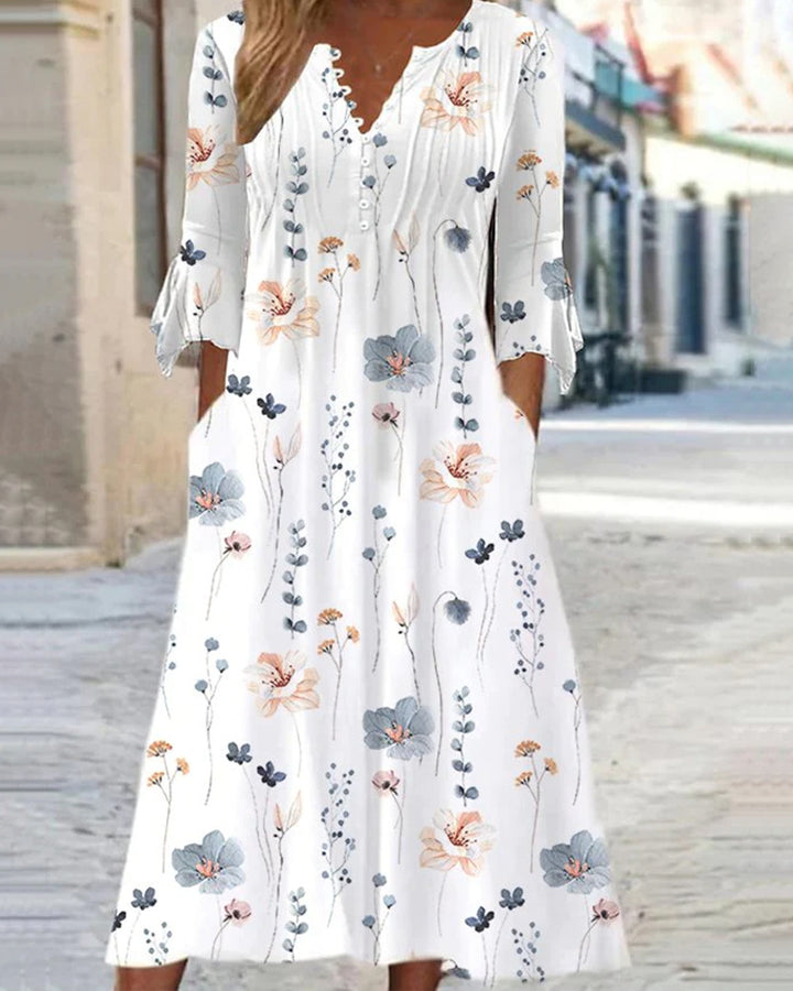 Women flowing midi dress with V-neck, decorative button placket, chest pleats, bow sleeves and side pockets Mune Fashion
