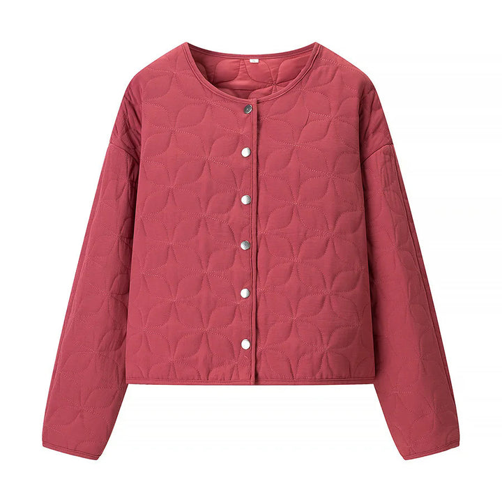 Women's quilted boxy transitional jacket with floral quilted texture, lightly padded inner lining and press stud placket Mune Fashion