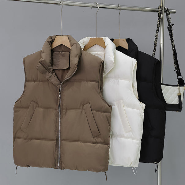 Women's short padded boxy vest with high collar, concealed zipper and adjustable hem Mune Fashion