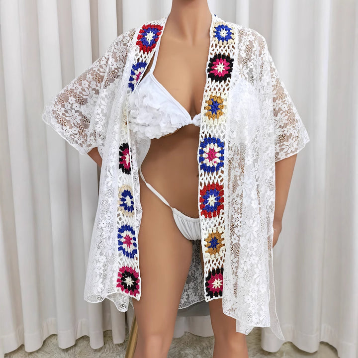 Women crocheted beach cover-up with colorful appliqués Mune Fashion