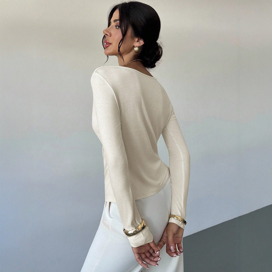 Women's elegant draped long sleeve top with waterfall collar and tailored silhouette Mune Fashion