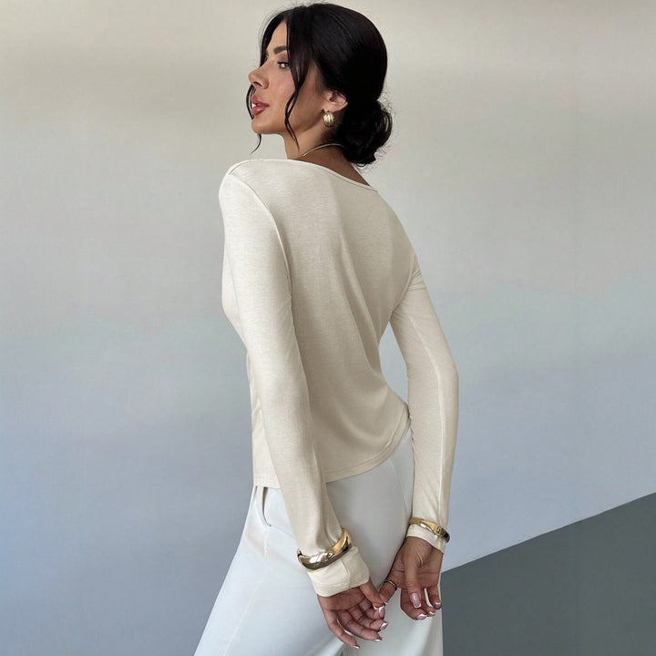 Women's elegant draped long sleeve top with waterfall collar and tailored silhouette Mune Fashion