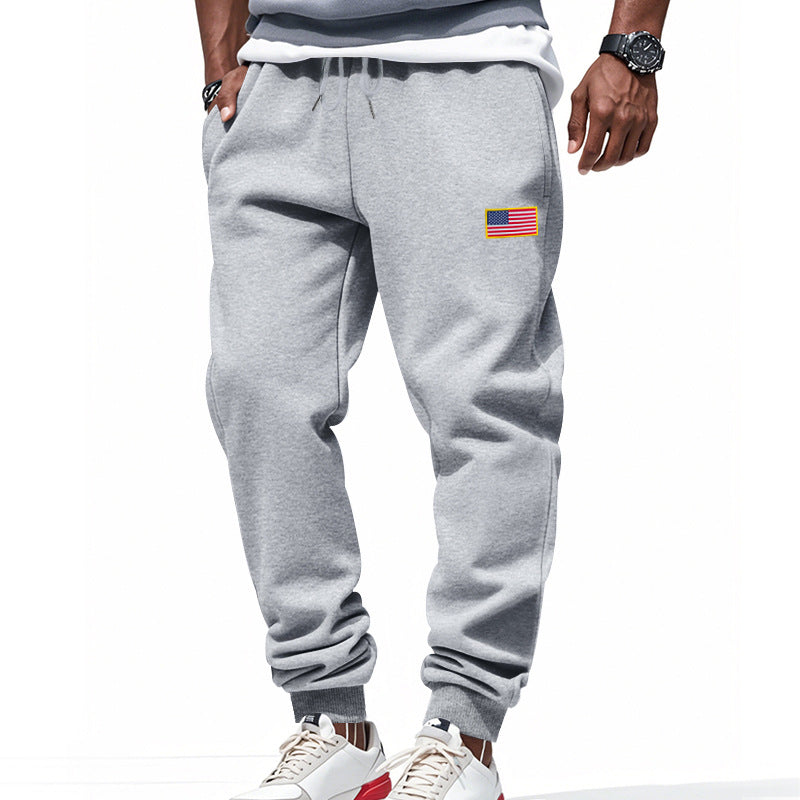 Men's slim-fit sweatpants with tapered leg, elastic drawstring waistband, and discreet flag application Mune Fashion