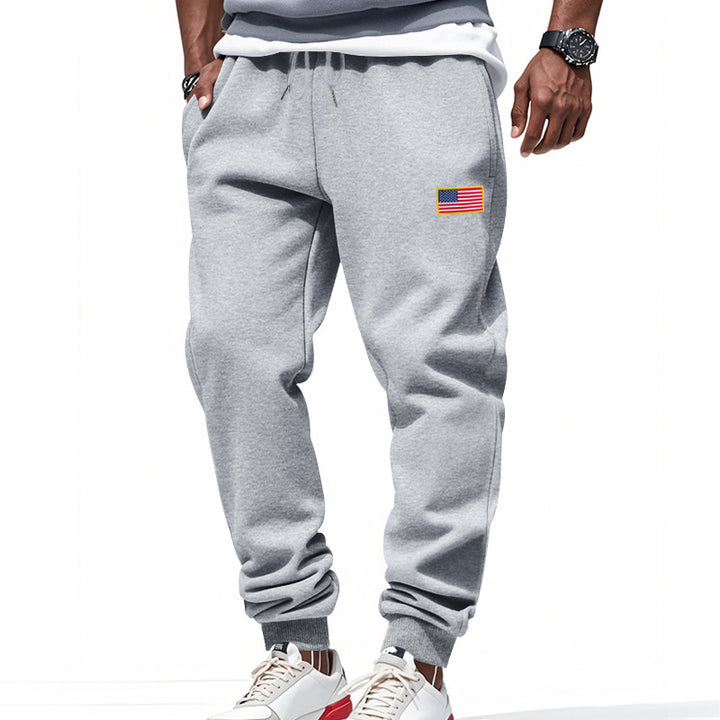 Men's slim-fit sweatpants with tapered leg, elastic drawstring waistband, and discreet flag application Mune Fashion