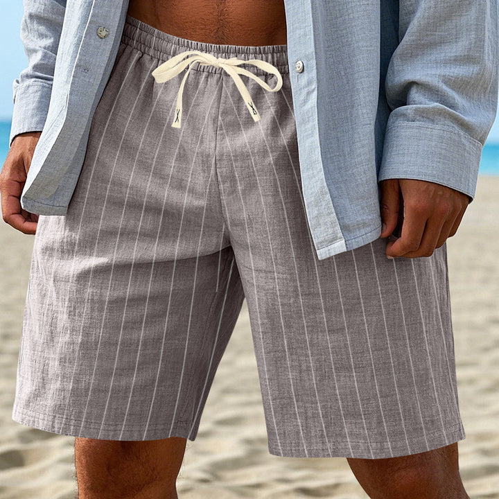 Men's relaxed beach Bermuda shorts with fine pinstripe structure, elastic drawstring waistband, and side slip pockets Mune Fashion