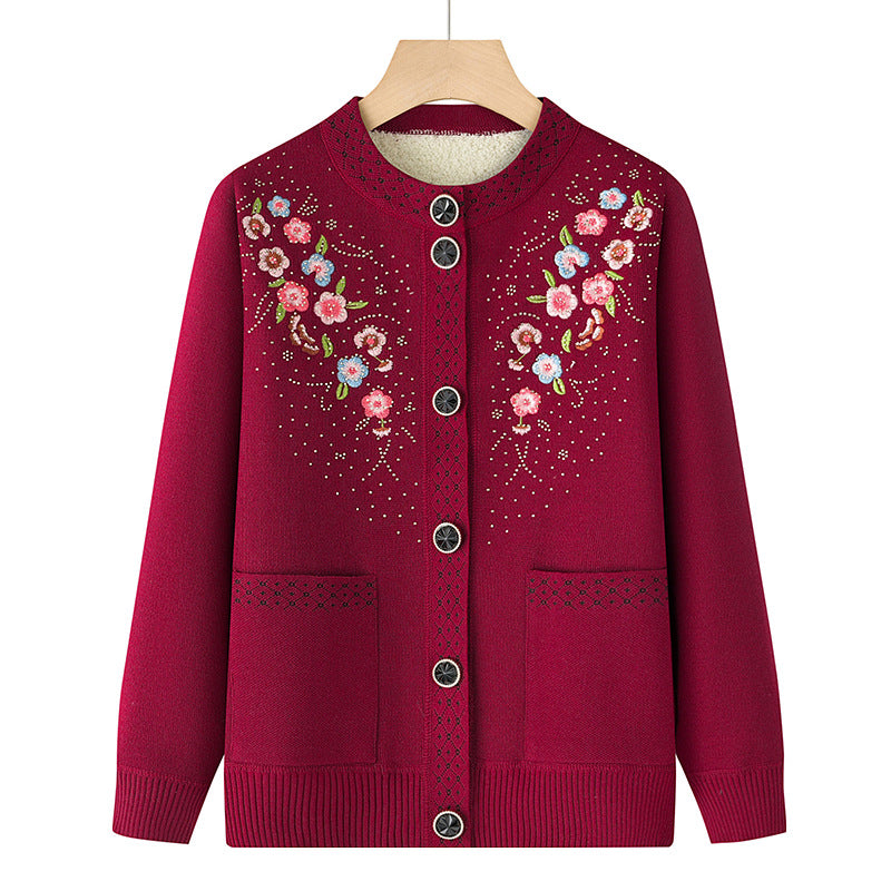 Women's embroidered cardigan with round neck, patch pockets, and decorative button placket Mune Fashion