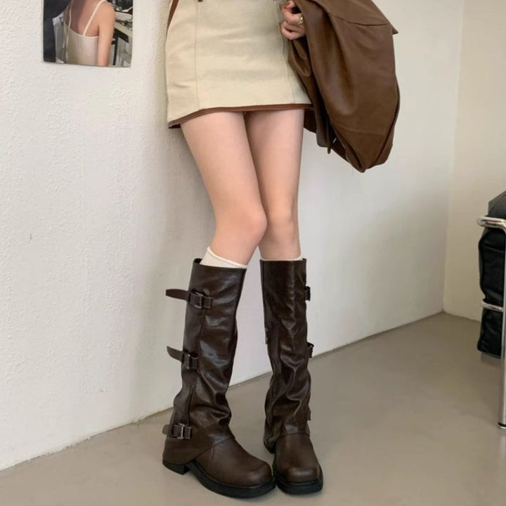 Women's knee-high slouch boots made of synthetic leather with adjustable buckles and textured platform heel Mune Fashion