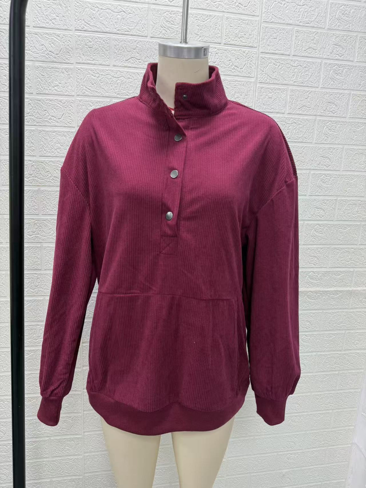 Women's ribbed Henley pullover with stand collar and kangaroo pocket Mune Fashion