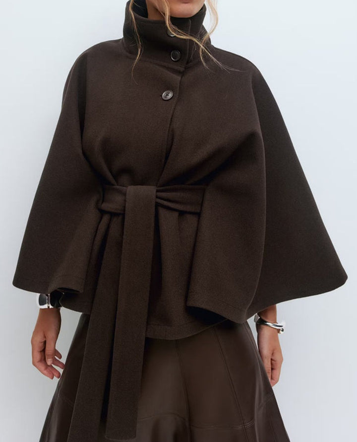 Women's Widely Cut Cape Coat with High Stand-up Collar, Button Placket, and Tie Belt Mune Fashion