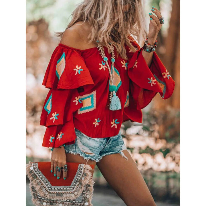 Women's Boho top with off-the-shoulder neckline, layered flounce sleeves, and elaborate embroidery Mune Fashion