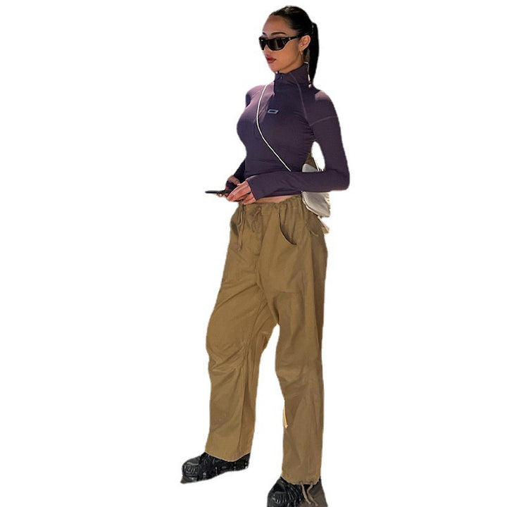 Women's form-fitting long sleeve zip top with deep V-neck and elastic functional stretch Mune Fashion