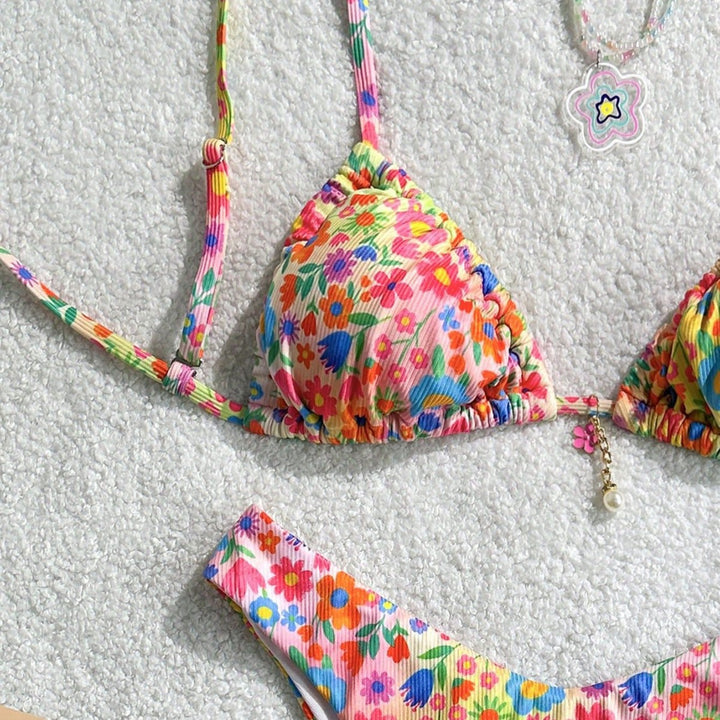 Women's triangle bikini with colorful floral design and fine ruffle details Mune Fashion