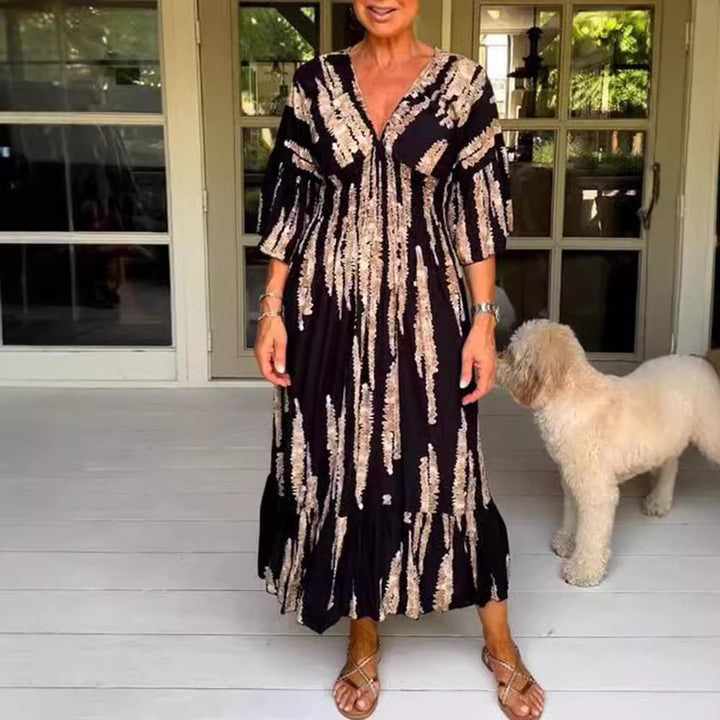 Women's maxi dress with V-neck, vertical brush print, gathered underbust seam and tiered ruffle skirt Mune Fashion