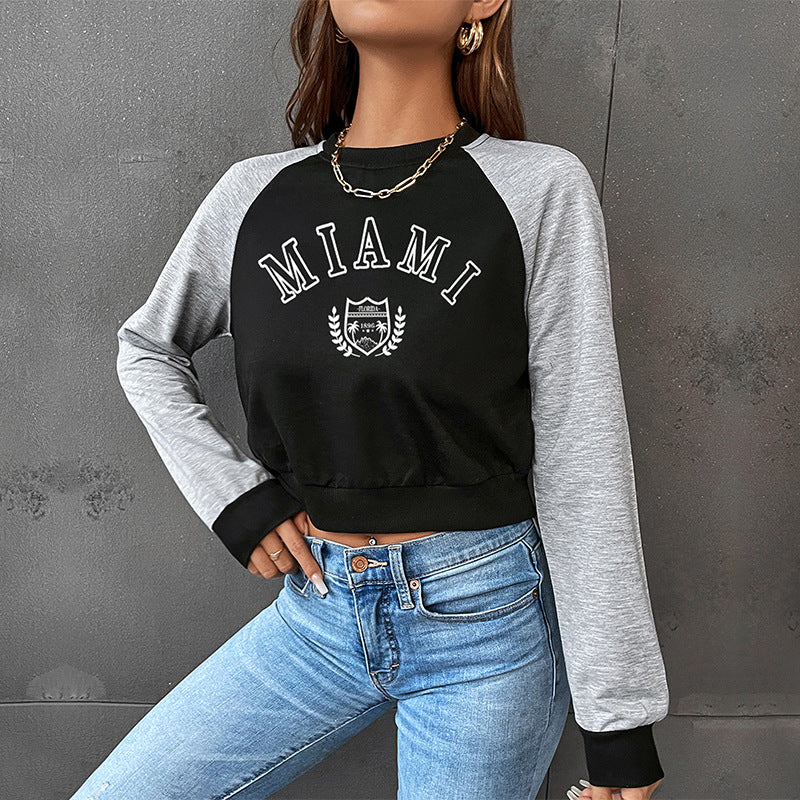 Women Short-Cropped College Sweatshirt with Raglan Sleeves and Elastic Hem Mune Fashion