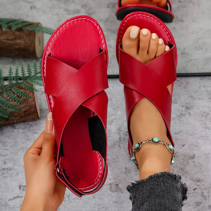 Women  lightweight leather sandals with crossed straps and padded outsole Mune Fashion