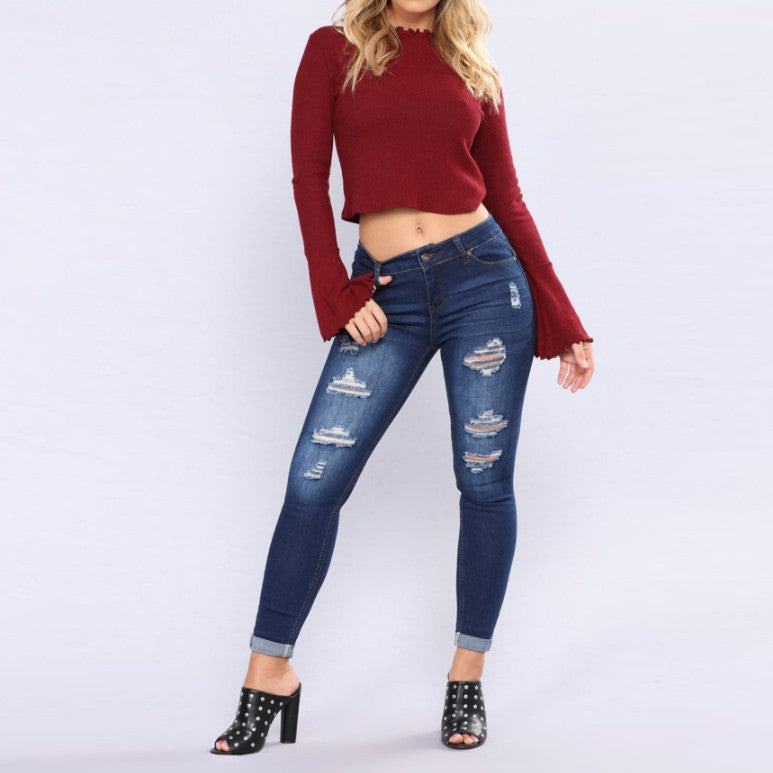 Women high-rise skinny jeans with destroyed details and rolled ankle cuffs Mune Fashion
