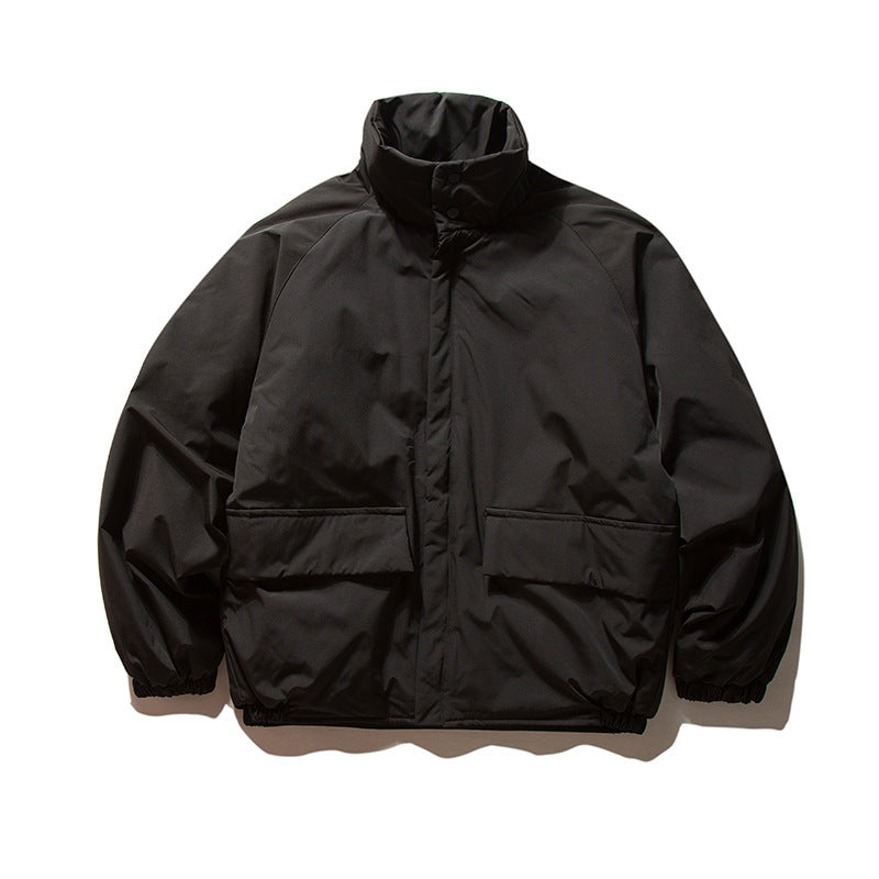 Unisex Boxy Padded Transition Jacket with High Stand-Up Collar, Elastic Cuffs and Flap Pockets Mune Fashion