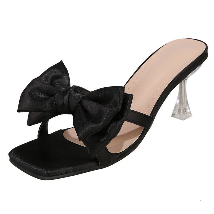Women's satin mules with large decorative bow and transparent stiletto heel Mune Fashion