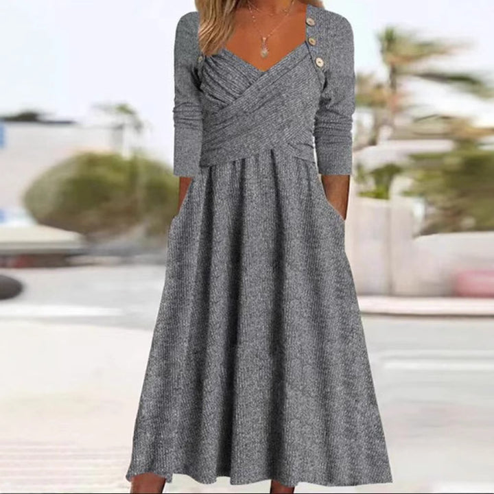 Women's knitted maxi dress with wrap top V-neck, side pockets and decorative button placket Mune Fashion