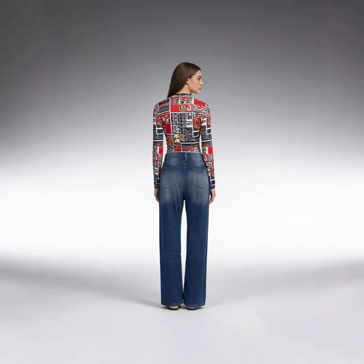 Women's high-cut relaxed jeans with wide leg, knee rips, and raw hem Mune Fashion