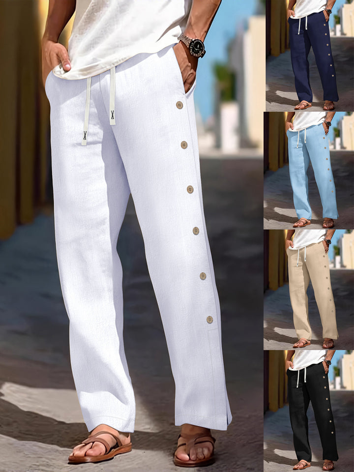 Men's loose leisure pants with side decorative button placket, drawstring waistband, and deep front pockets Mune Fashion