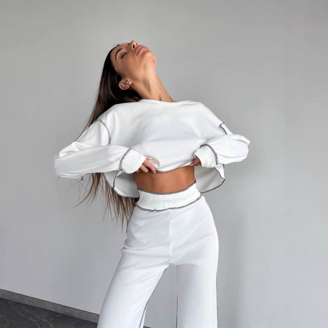 Women Cropped Oversized Sweatshirt with Overlock Seams and High-Waist Flared Pants Set Mune Fashion