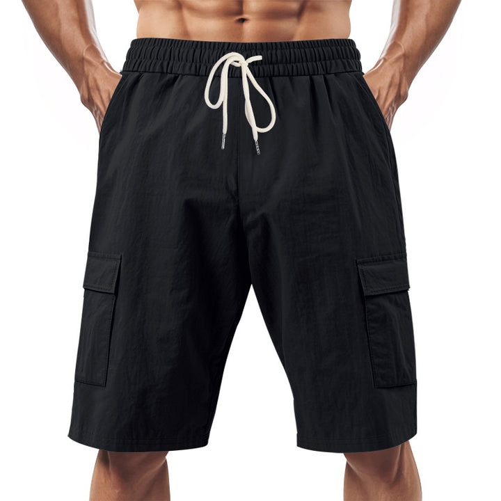 Men's technical cargo shorts with elastic drawstring waistband, secure flap pockets, and quick-drying functional material Mune Fashion