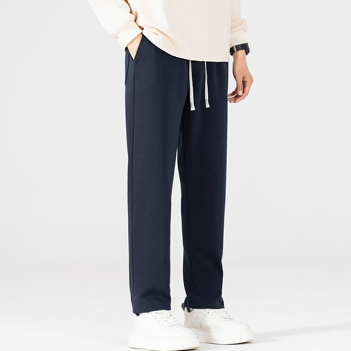 Men's loose-fitting fleece jogging pants with drawstring waistband and elastic leg cuffs Mune Fashion