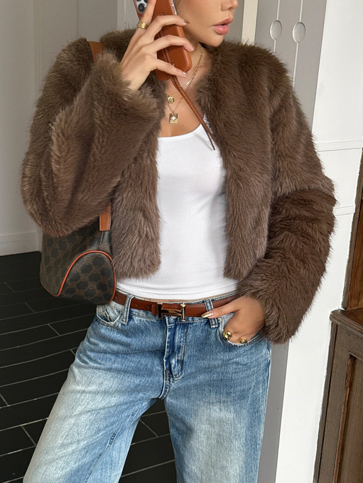 Women's short faux-fur jacket with voluminous sleeves, open cut and cozy inner lining Mune Fashion
