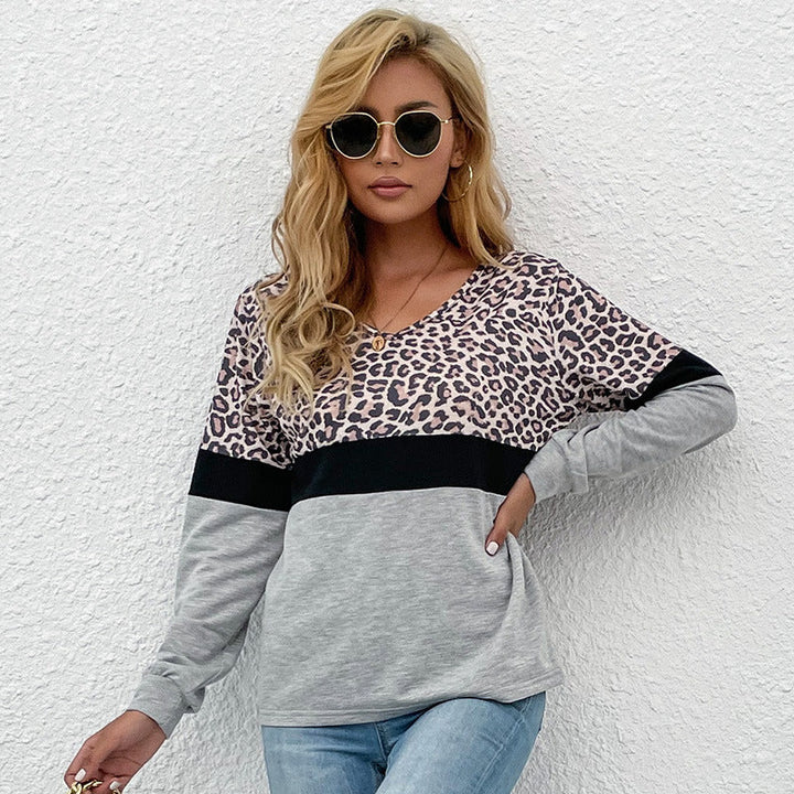 Women's long sleeve shirt with V-neck and leopard print in color block design Mune Fashion
