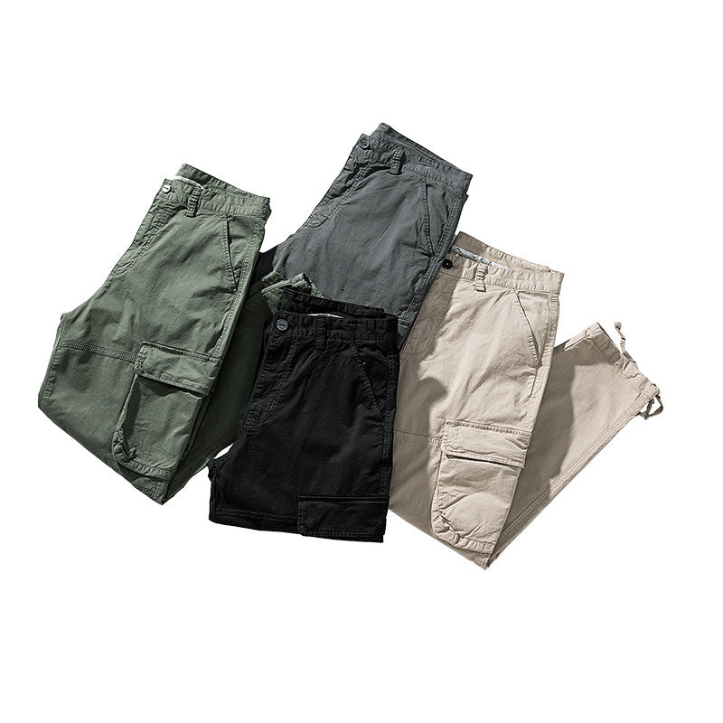 Herren Cargo‑Hose im Utility‑Workwear‑Stil mit großen Klappentaschen, Kniepaneelen und Kordelabschluss Mune Fashion