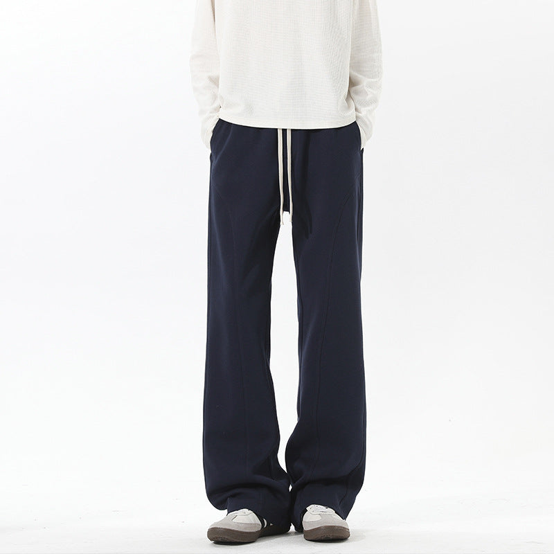 Men's oversized sweatpants in baggy cut with drawstring and decorative seams Mune Fashion