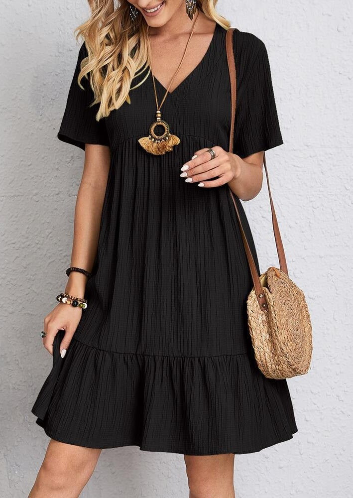Women nan Crinkle summer dress with V-neck, empire seam and ruffle hem Mune Fashion