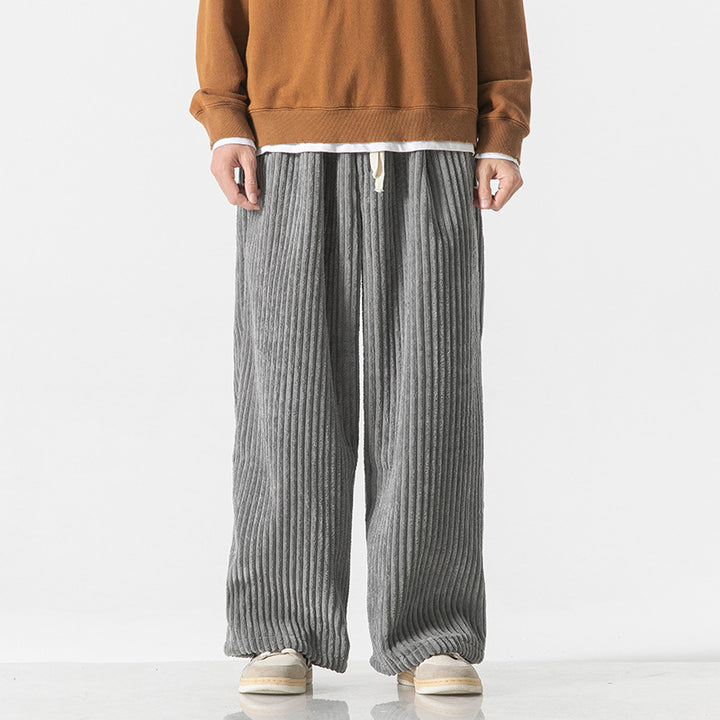 Men's loosely cut corduroy pants with drawstring waistband and distinctive ribbed texture Mune Fashion