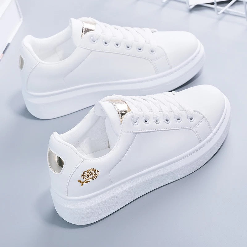Women's casual urban sneakers with subtle rose embroidery, elevated wedge sole profile and padded comfort insole Mune Fashion