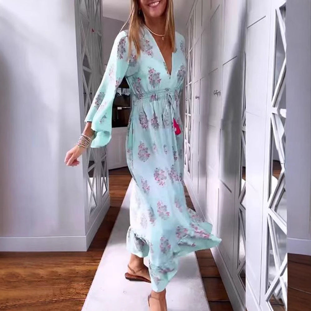 Women’s airy-flowing Boho midi dress with V-neck, gathered smock waist, drawstring with tassels, and asymmetrical ruffled hem Mune Fashion