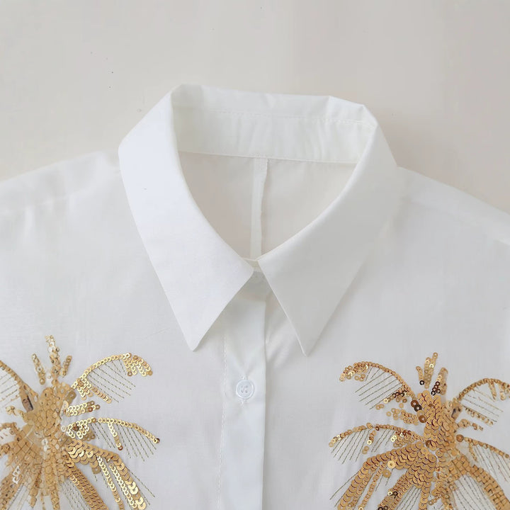 Women's loose-fitting shirt blouse with palm sequins, shirt collar and pearl detail Mune Fashion