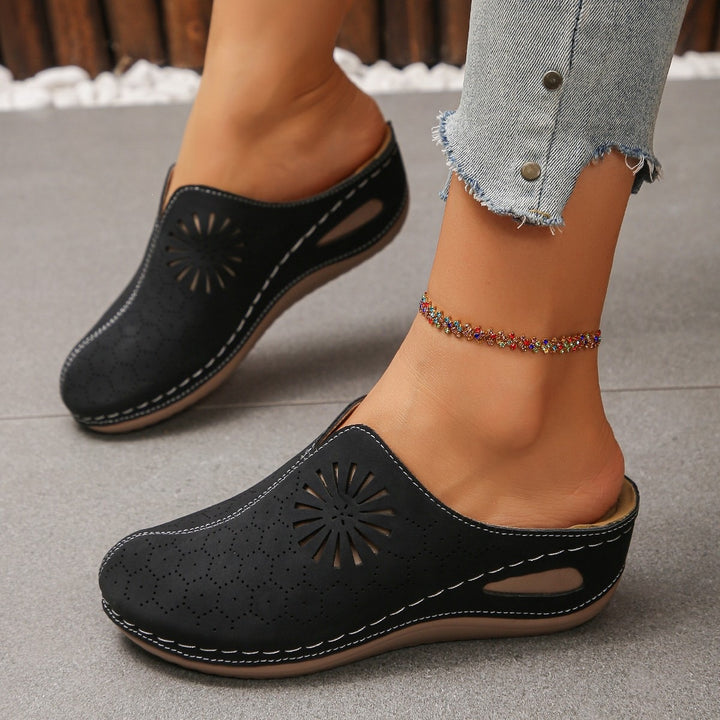 Women Comfortable Perforated Slipper Mules with Floral Cutouts and Padded Footbed Mune Fashion