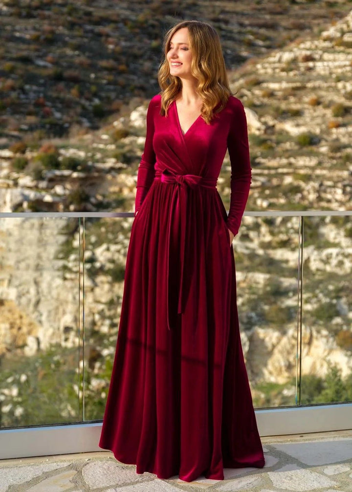 Women's elegant wrap maxi dress made of velvet with V-neck, waist belt, and side pockets Mune Fashion