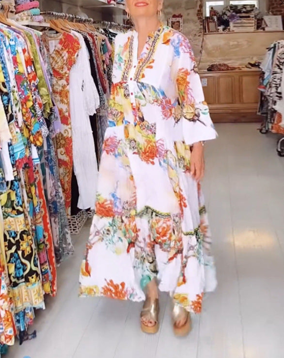 Women's airy maxi dress in layered look with V-neck, button placket, and three-quarter bell sleeves Mune Fashion