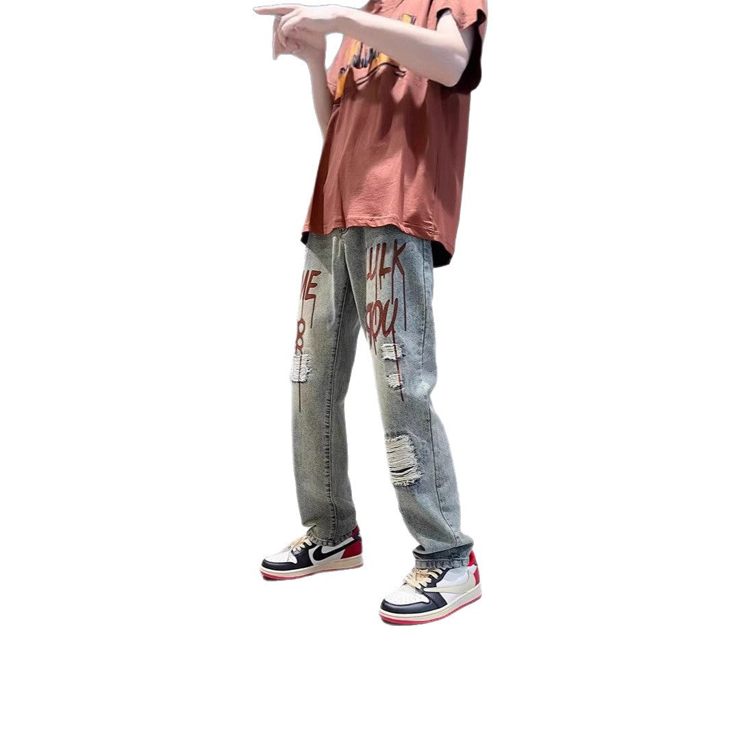 Ladies Fashion Destroyed Denim Jeans with Colorful Print Mune Fashion