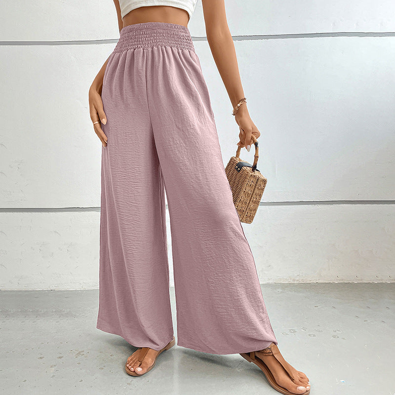 Women's palazzo pants with a high, elastic ruffled waistband and side pockets Mune Fashion