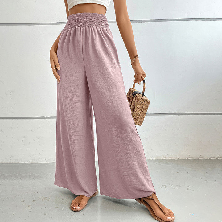 Women's palazzo pants with a high, elastic ruffled waistband and side pockets Mune Fashion