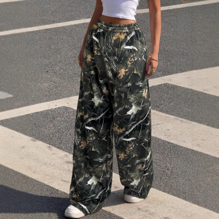 Women's wide Palazzo pants with floral all-over print and elastic waistband Mune Fashion